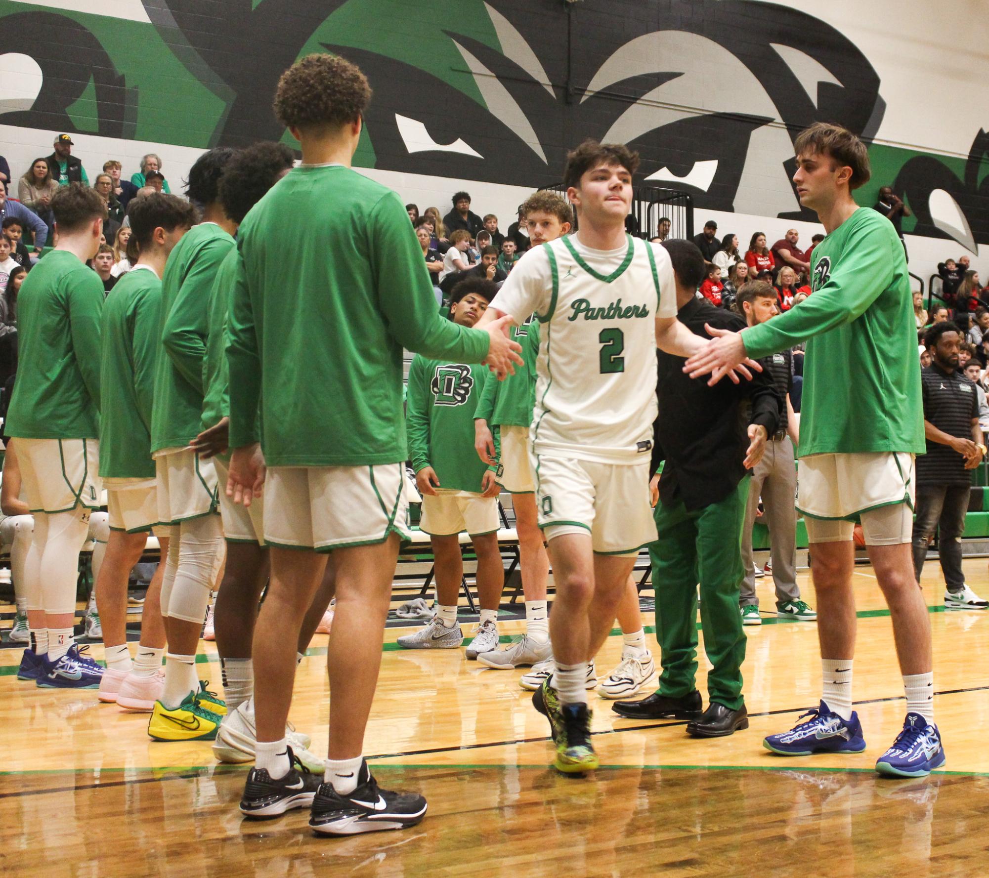 Varsity boys basketball vs. Maize (Photos by Betsy Ordinan)