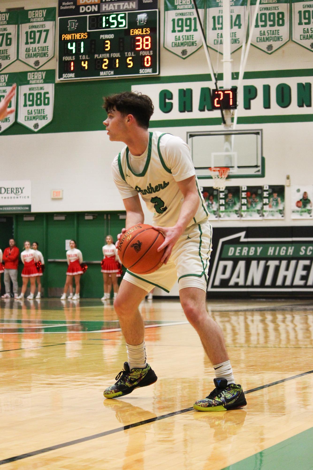 Varsity boys basketball vs. Maize (Photos by Betsy Ordinan)