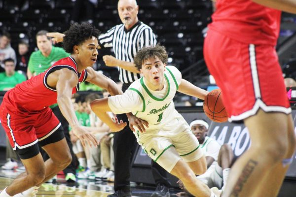 Navigation to Story: Boys state basketball vs. Olathe North (Photos by Emma Searle)