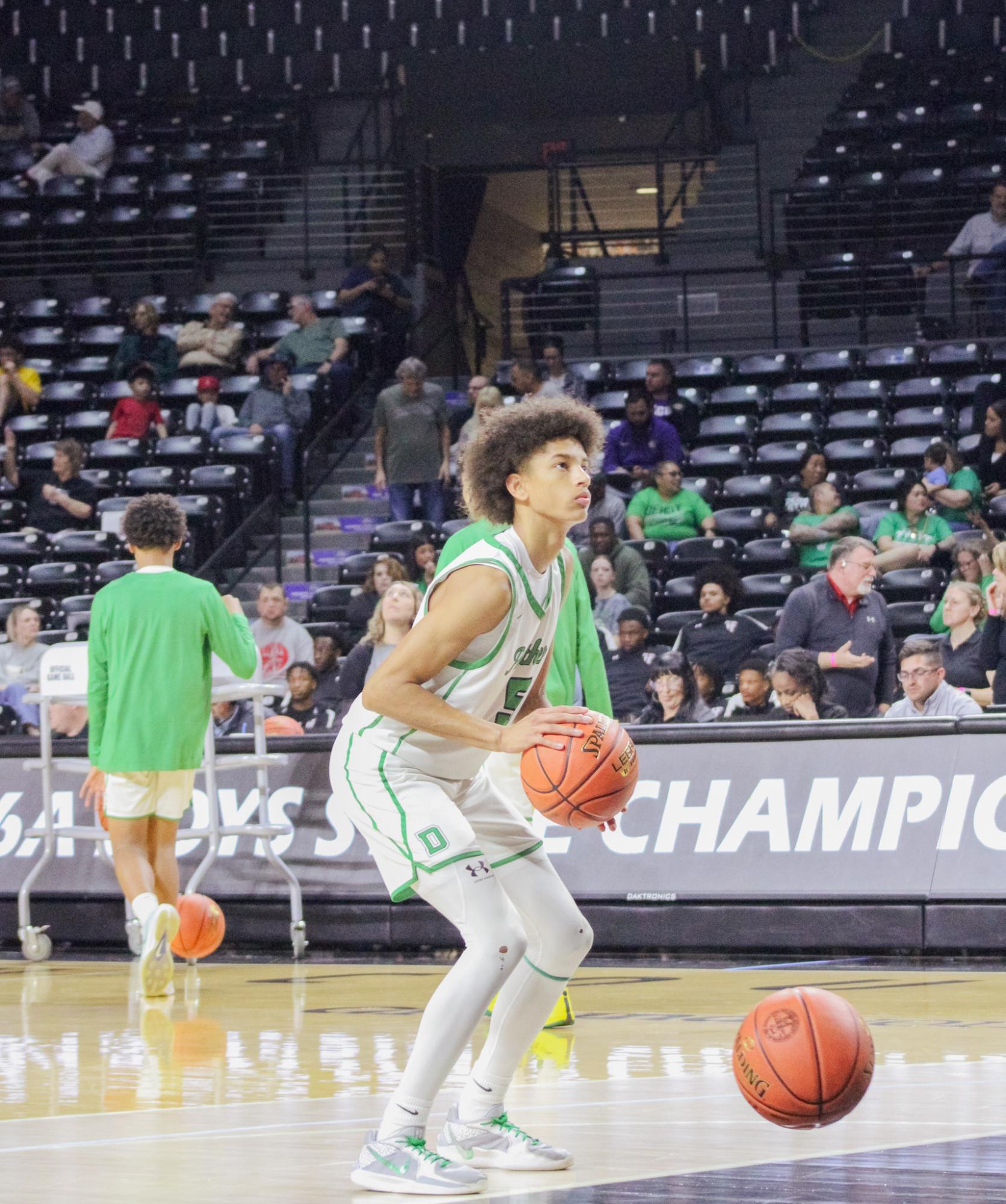 Boys basketball state playoffs vs. Olathe North (Photos by Ava Mbawuike)