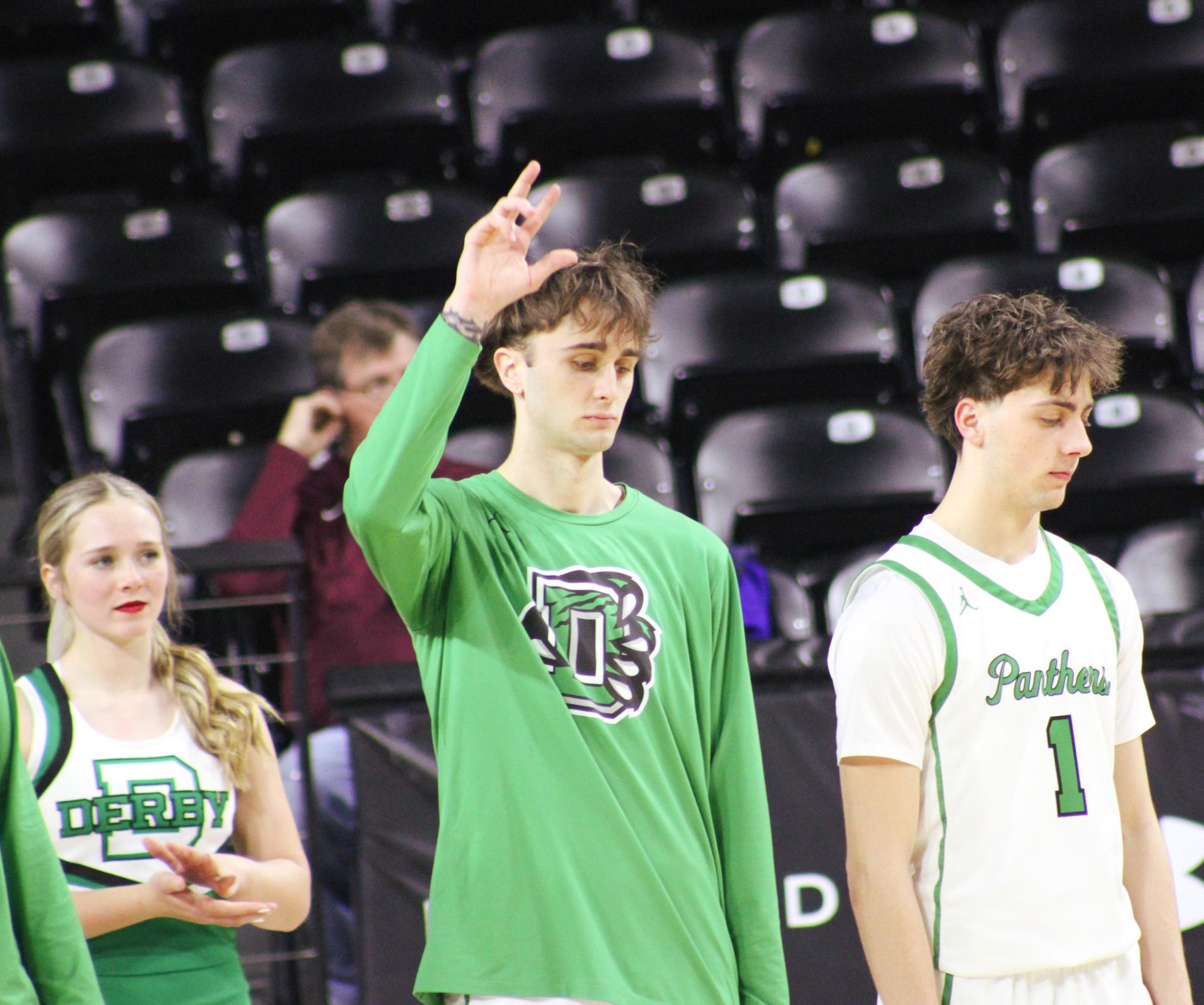 Boys basketball state playoffs vs. Olathe North (Photos by Ava Mbawuike)