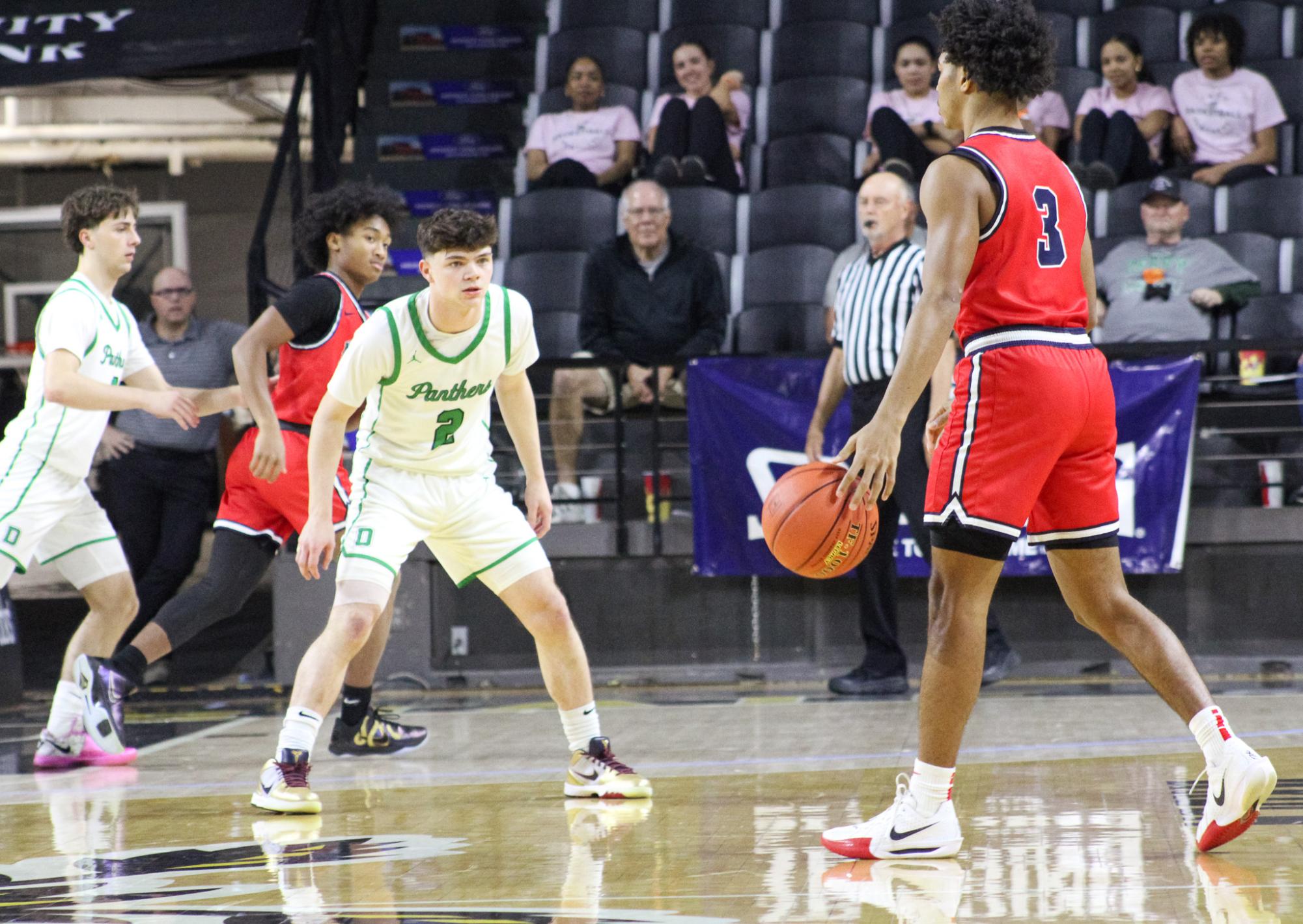 Boys basketball state playoffs vs. Olathe North (Photos by Ava Mbawuike)