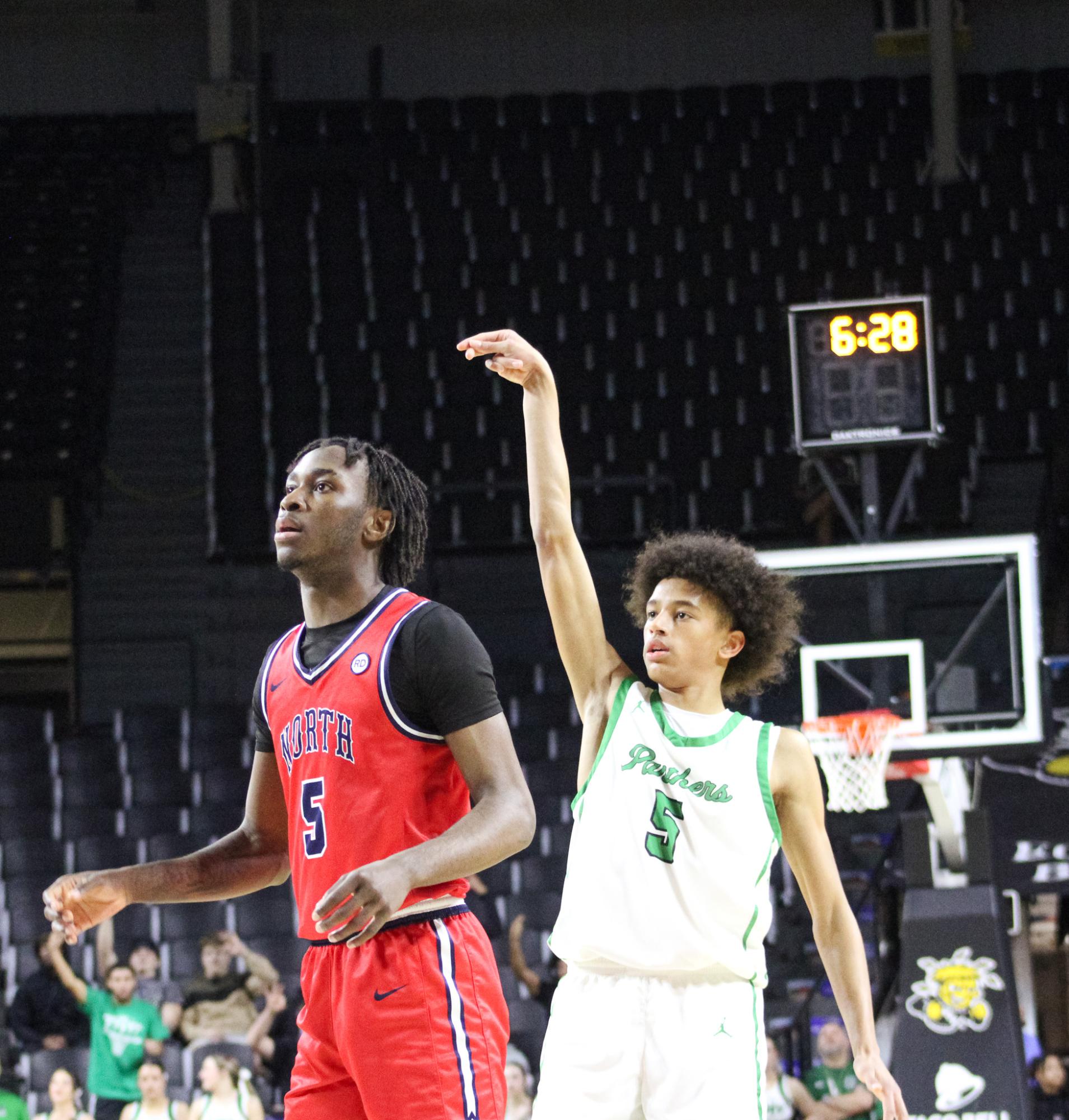 Boys basketball state playoffs vs. Olathe North (Photos by Ava Mbawuike)