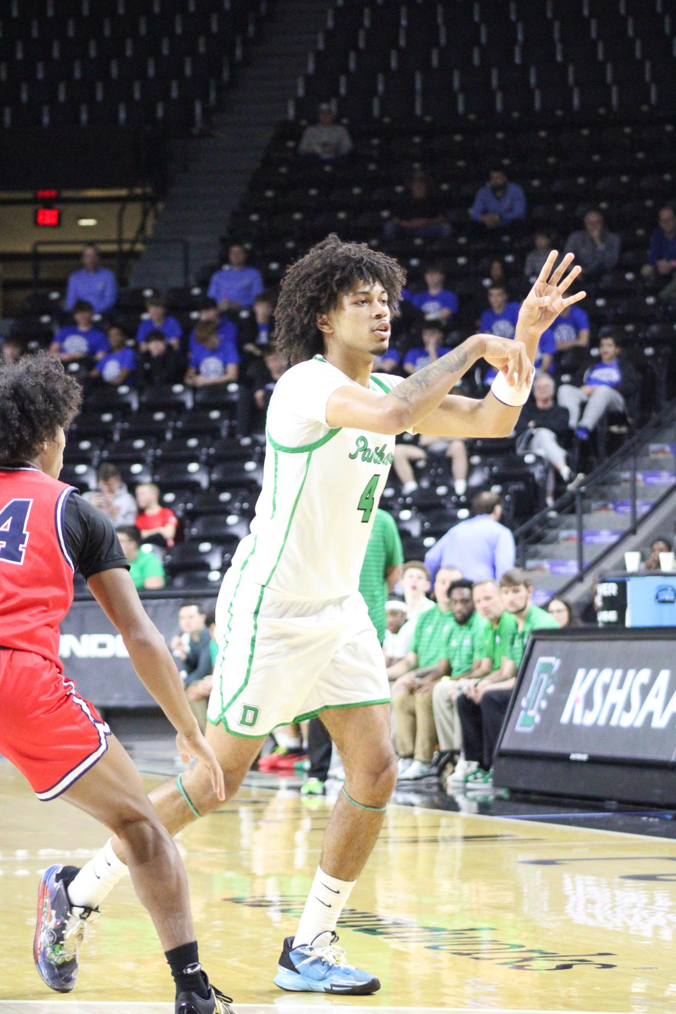 Boys basketball state playoffs vs. Olathe North (Photos by Ava Mbawuike)