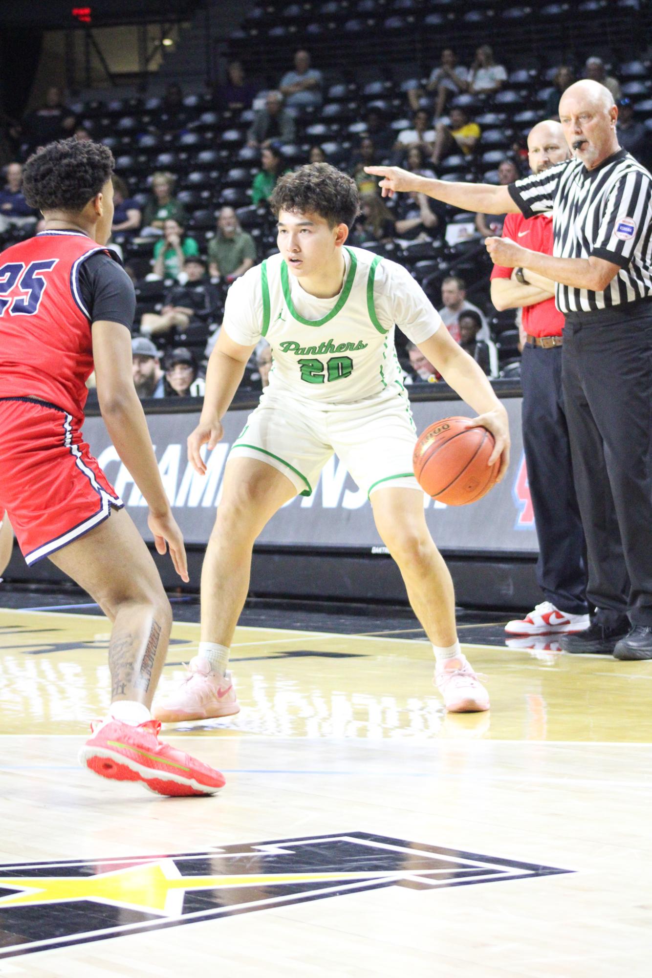 Boys basketball state playoffs vs. Olathe North (Photos by Ava Mbawuike)