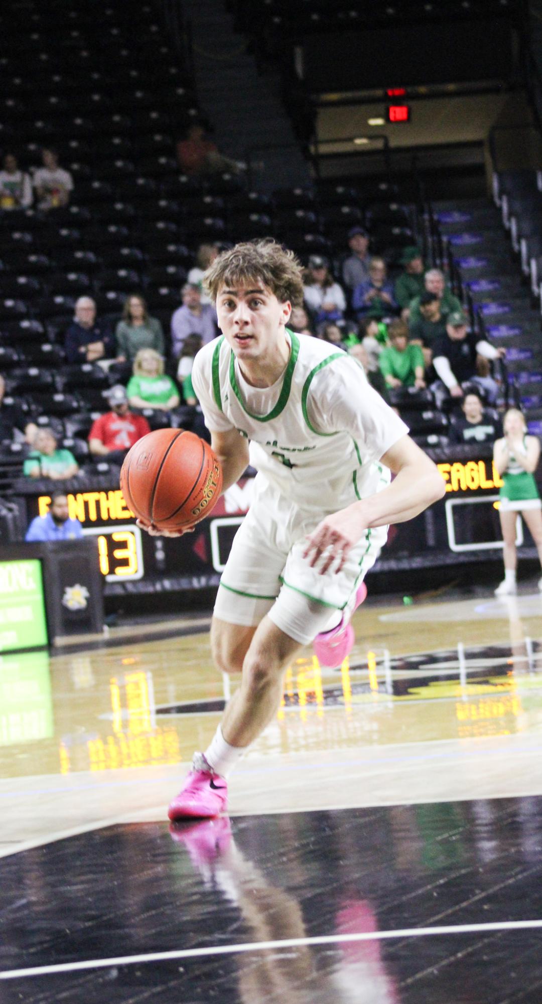 Boys basketball state playoffs vs. Olathe North (Photos by Ava Mbawuike)