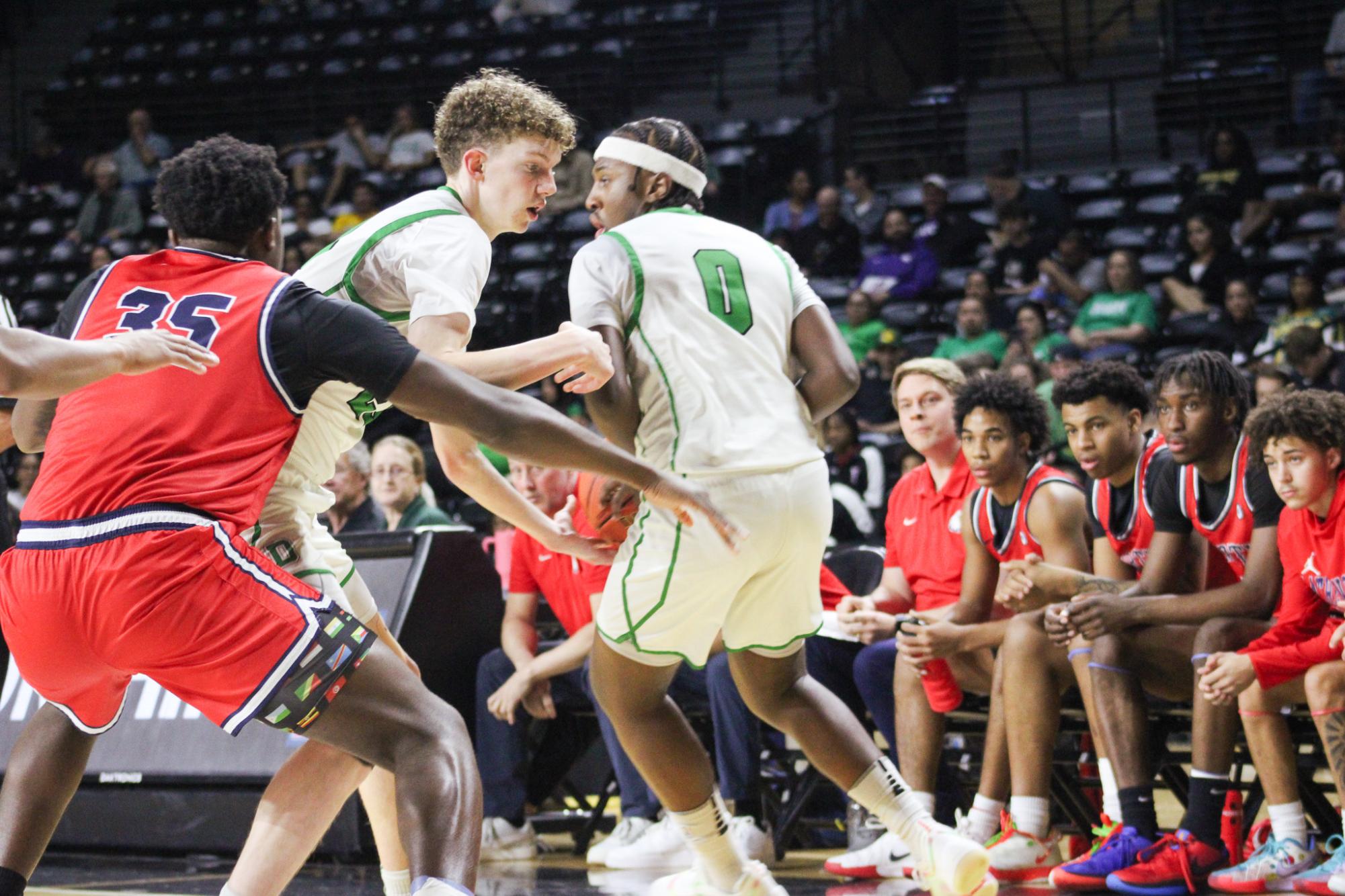 Boys basketball state playoffs vs. Olathe North (Photos by Ava Mbawuike)