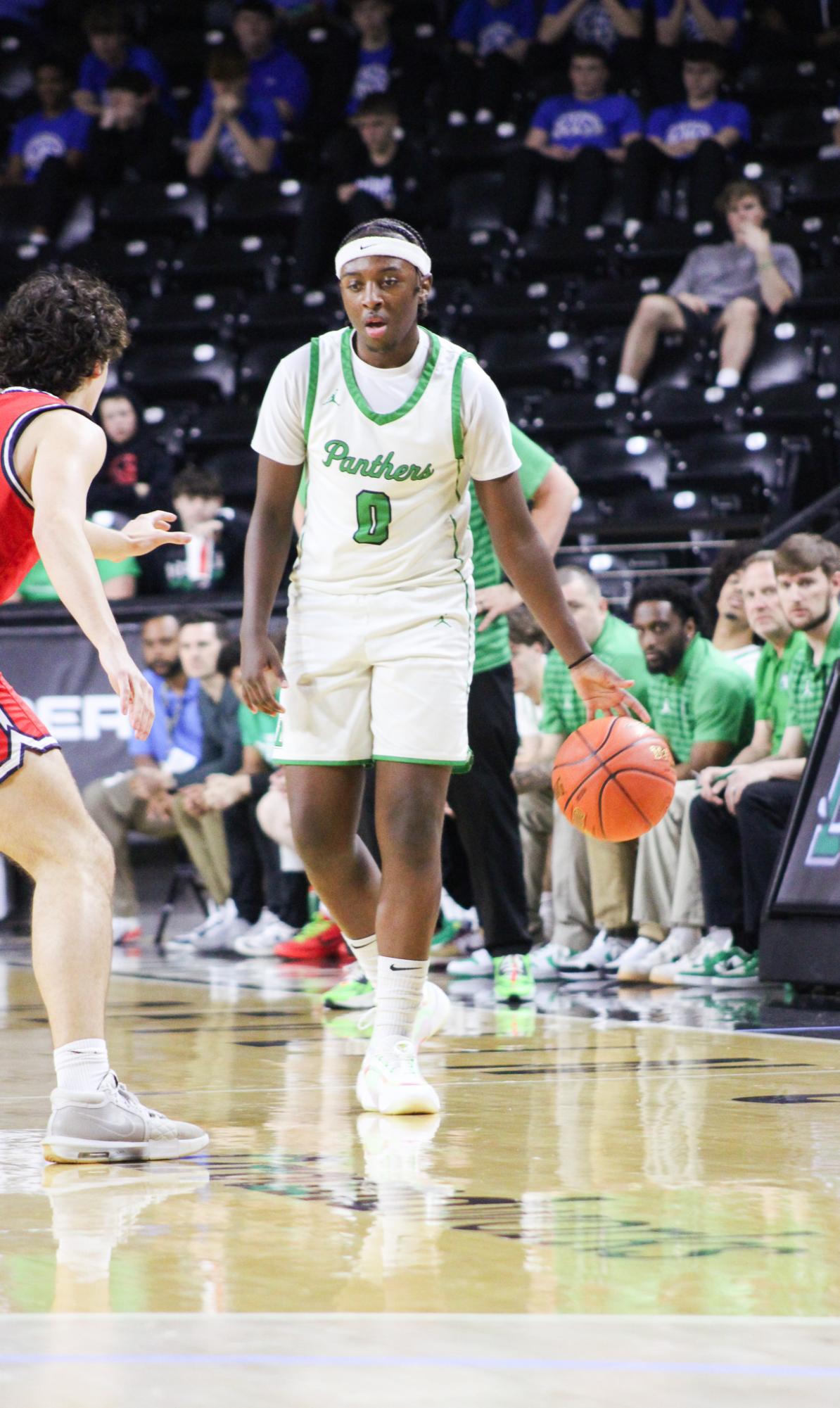 Boys basketball state playoffs vs. Olathe North (Photos by Ava Mbawuike)