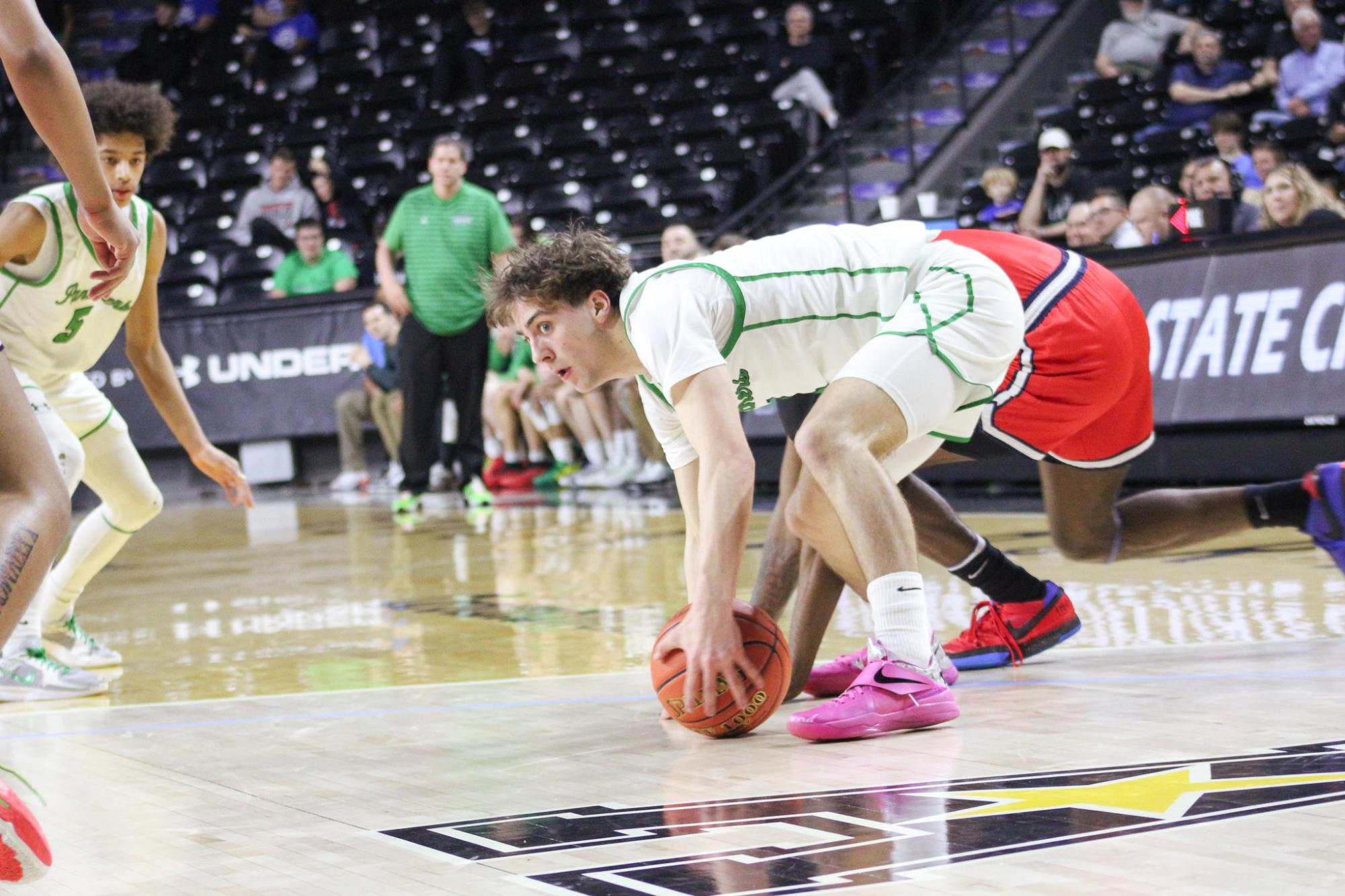 Boys basketball state playoffs vs. Olathe North (Photos by Ava Mbawuike)