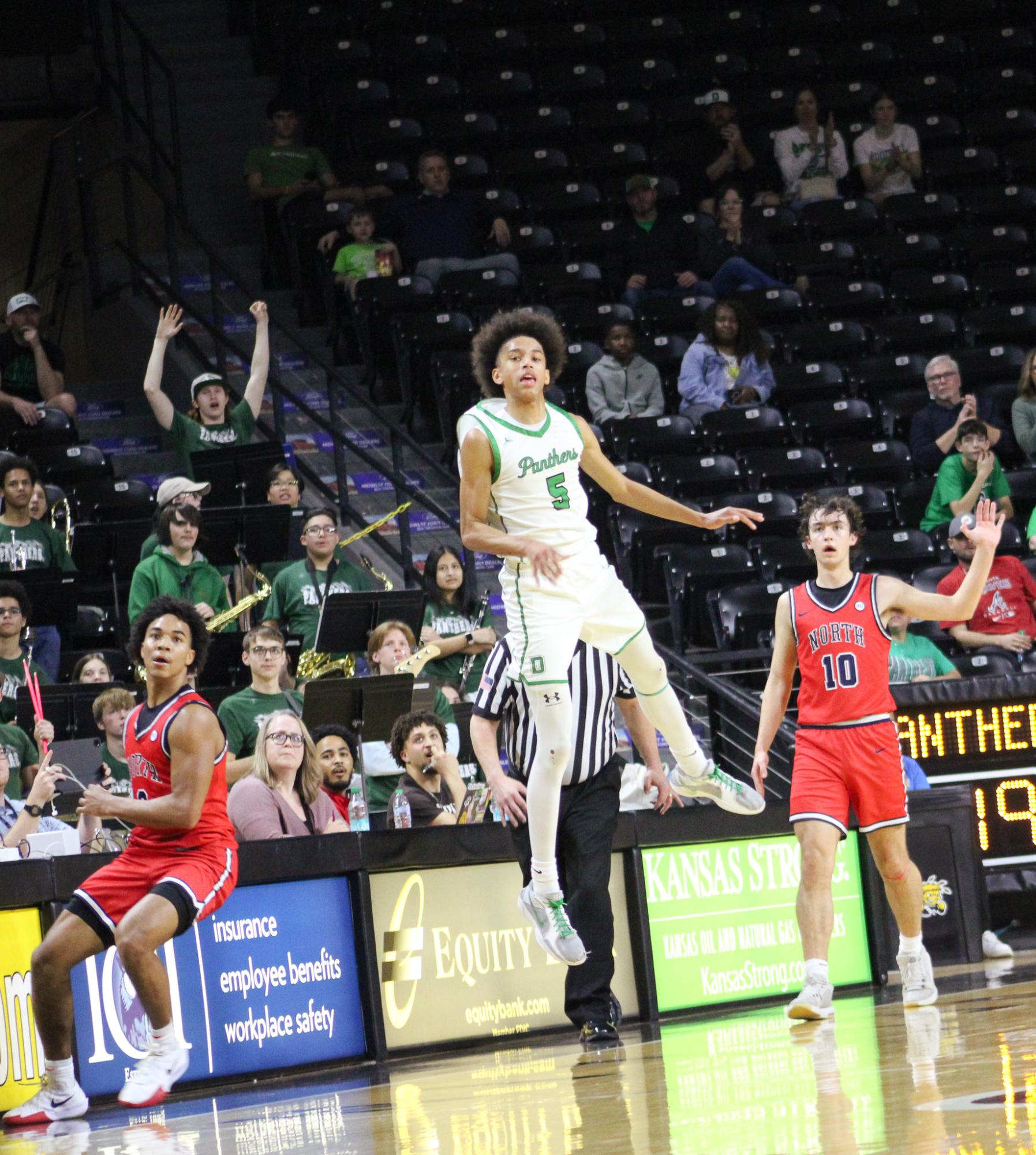 Boys basketball state playoffs vs. Olathe North (Photos by Ava Mbawuike)