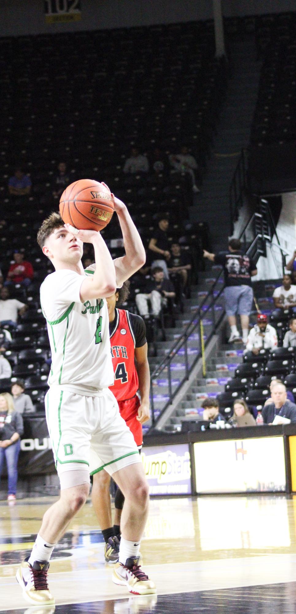 Boys basketball state playoffs vs. Olathe North (Photos by Ava Mbawuike)