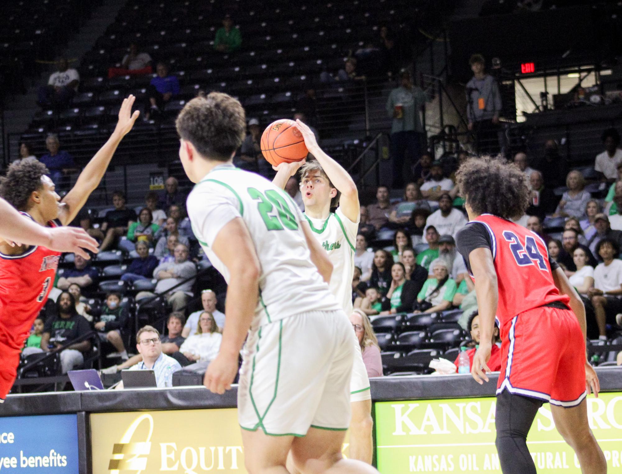 Boys basketball state playoffs vs. Olathe North (Photos by Ava Mbawuike)