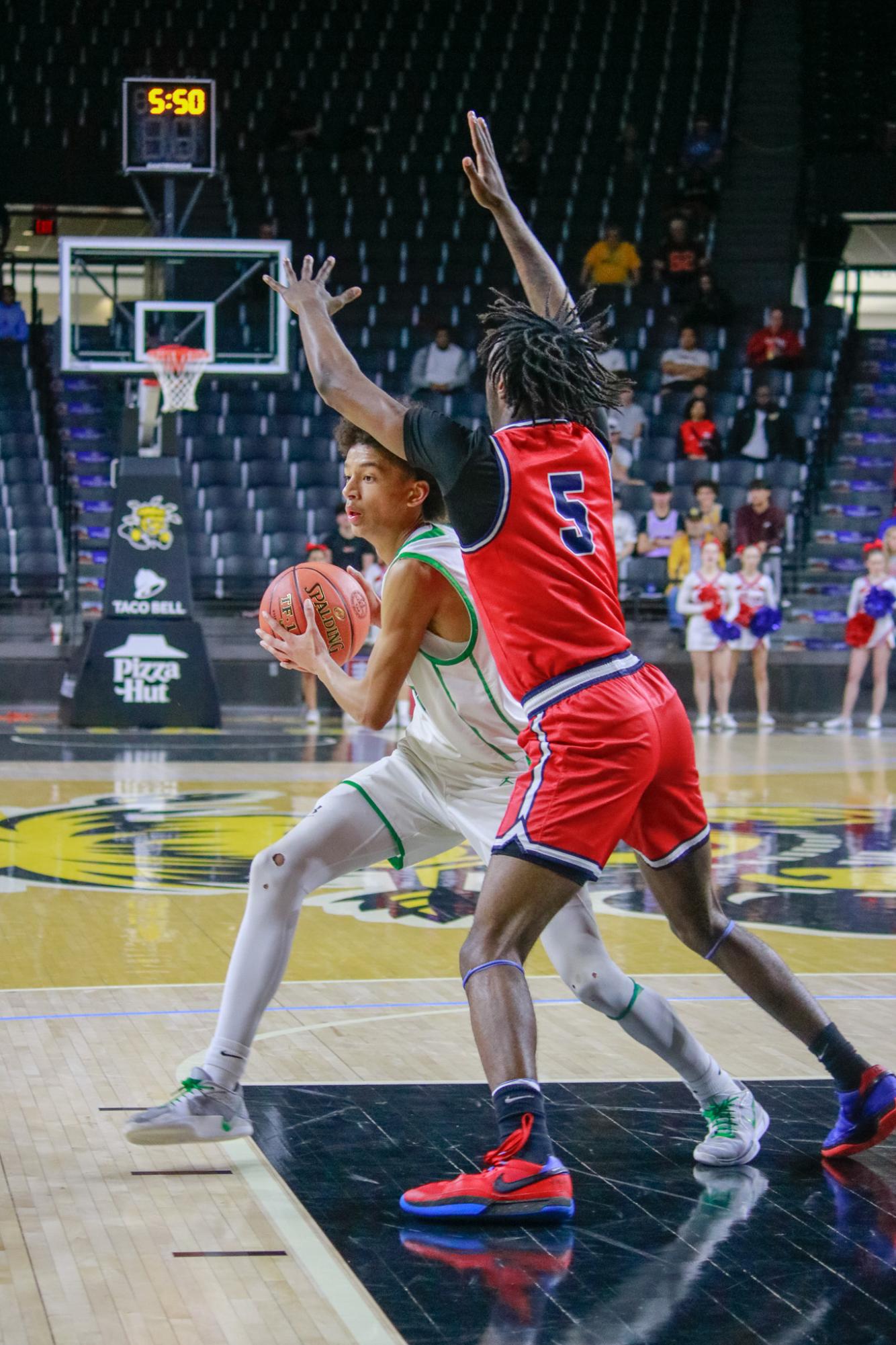 Boys varsity basketball vs. Olathe North (Photos by Persephone Ivy)