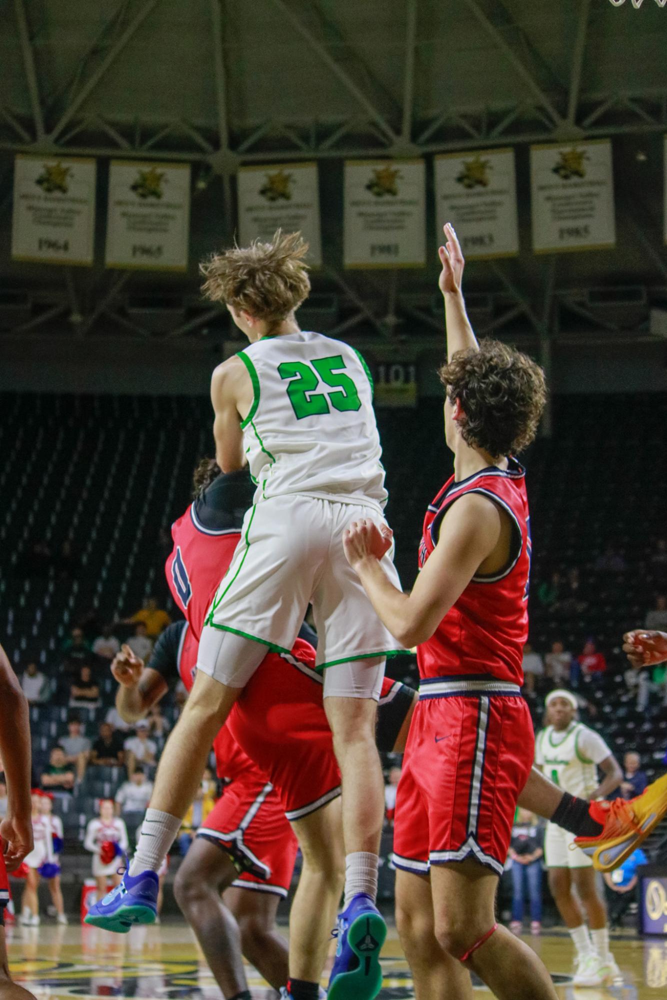 Boys varsity basketball vs. Olathe North (Photos by Persephone Ivy)