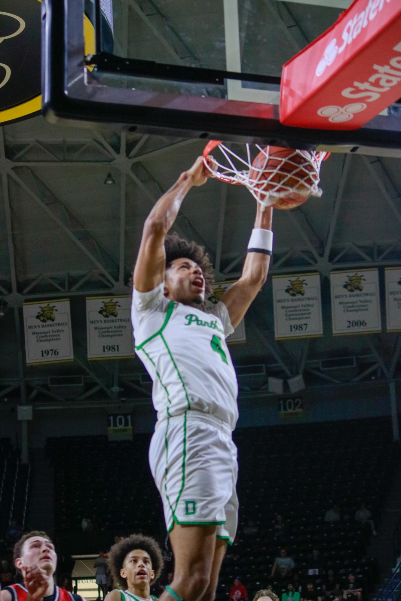 Boys varsity basketball vs. Olathe North (Photos by Persephone Ivy)