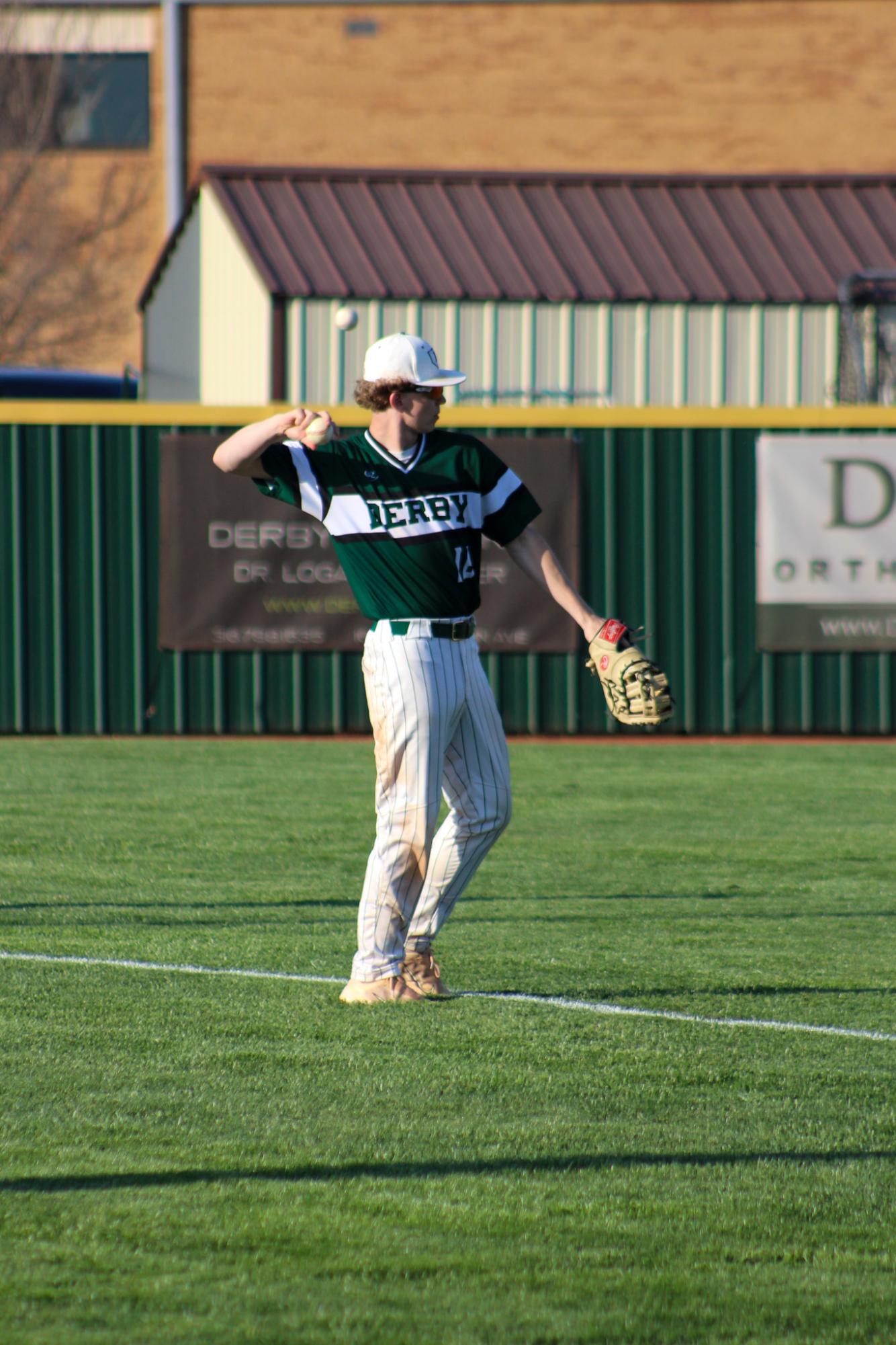 Varsity Baseball Vs. Hutchinson (photos by Stevie Hoppock)