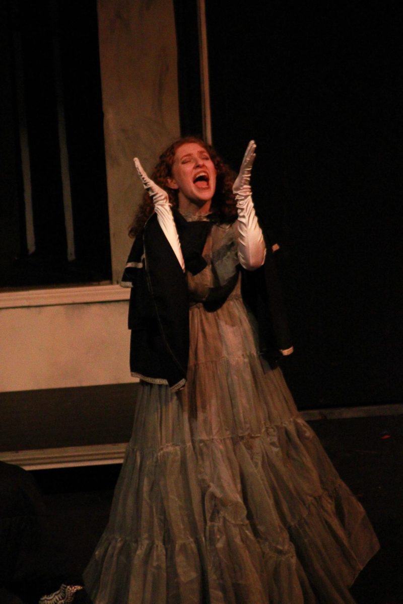 Junior Alaura Miller performs on stage.