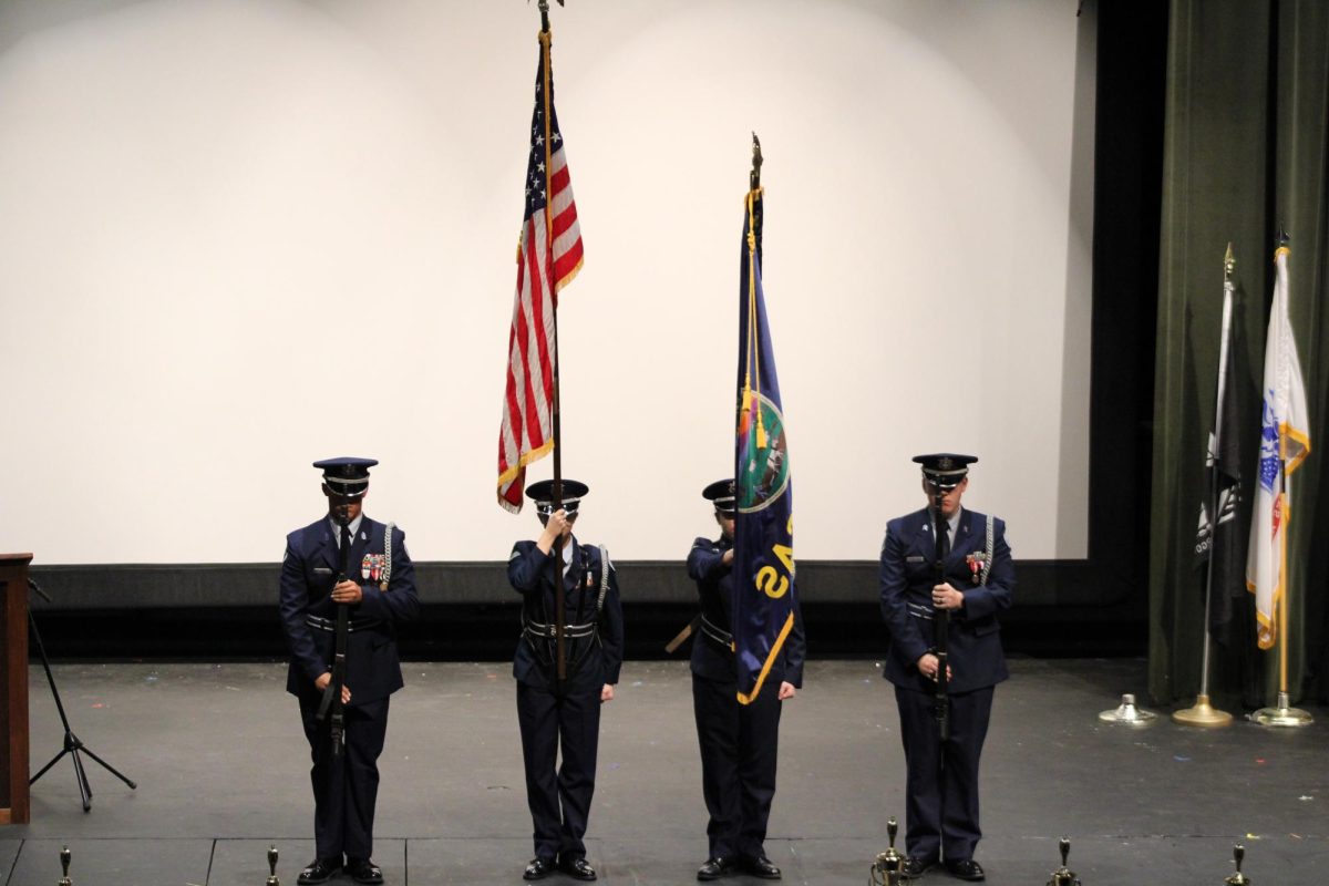 Color guard presents the national anthem at award ceremony. 