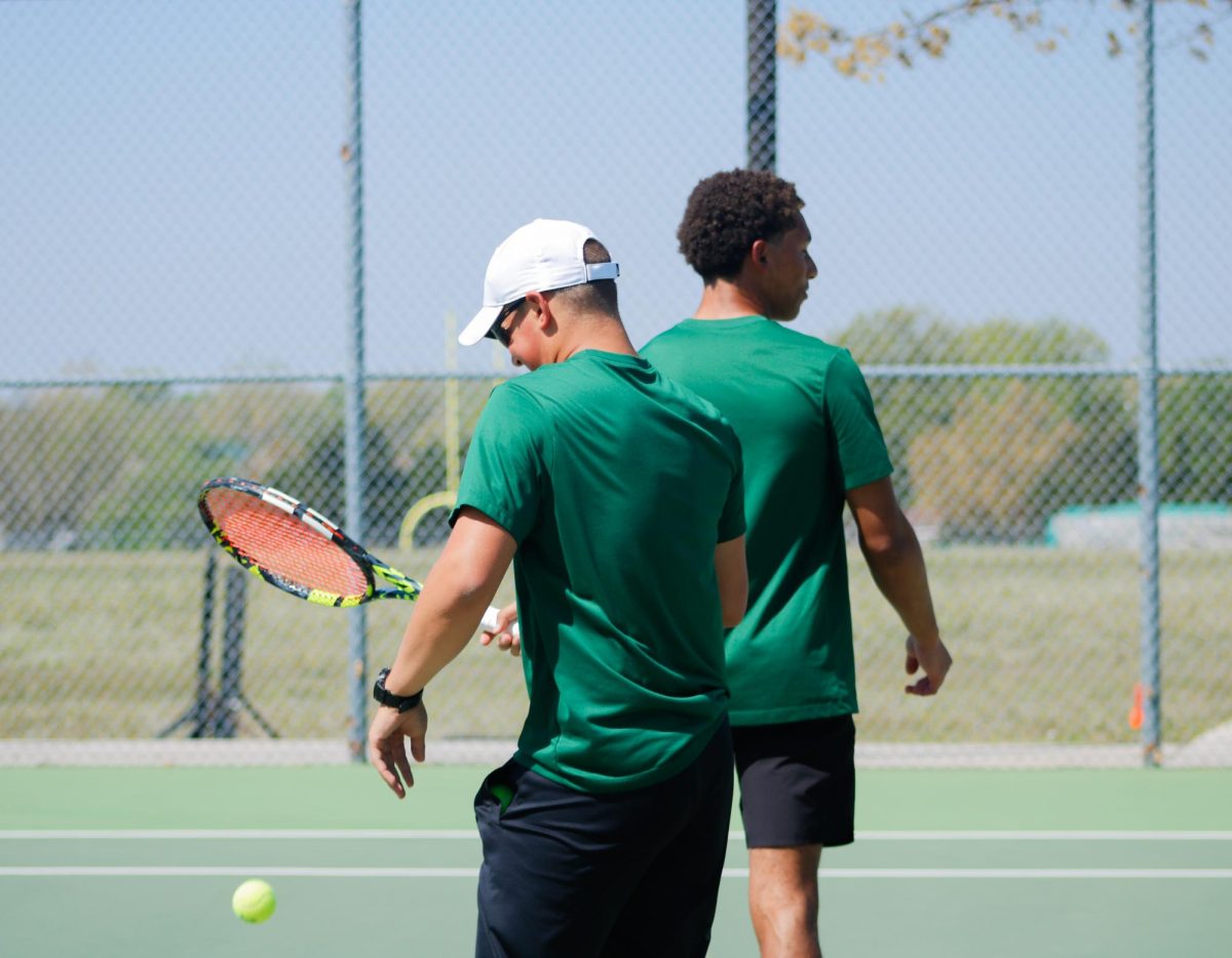 Doubles-pairs walk back onto the court. 
