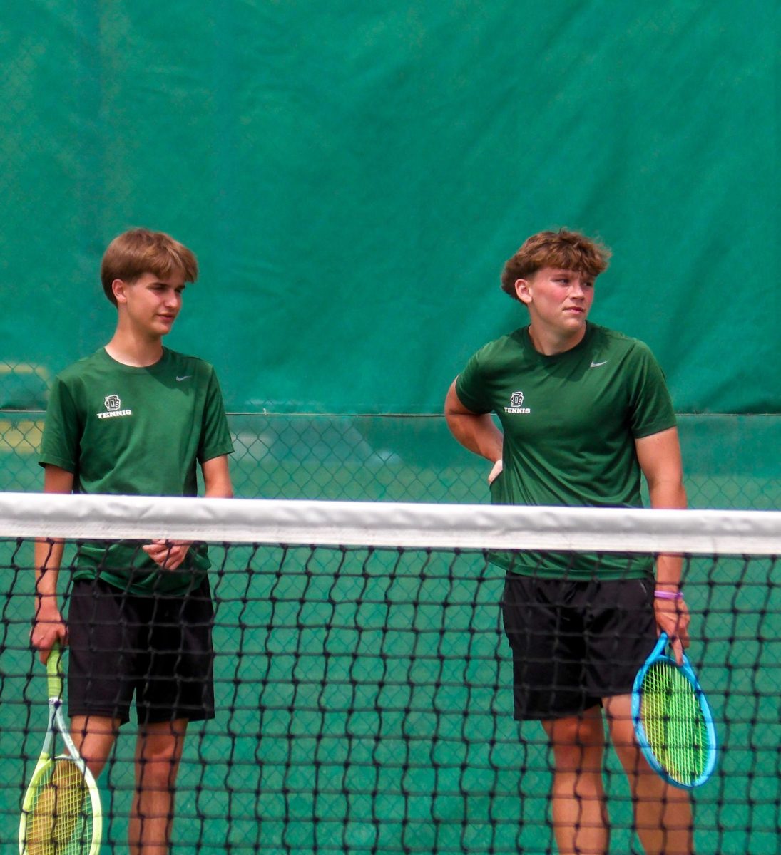 Junior Jayce Johnson and Junior Landen Highsmith are waiting for their opponents.