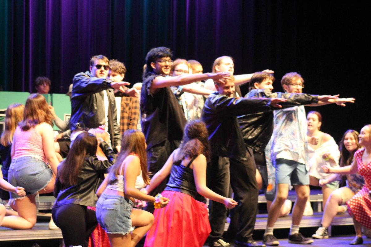 Madrigals sing "Cruisin' for a Bruisin'" from Teen Beach Movie.