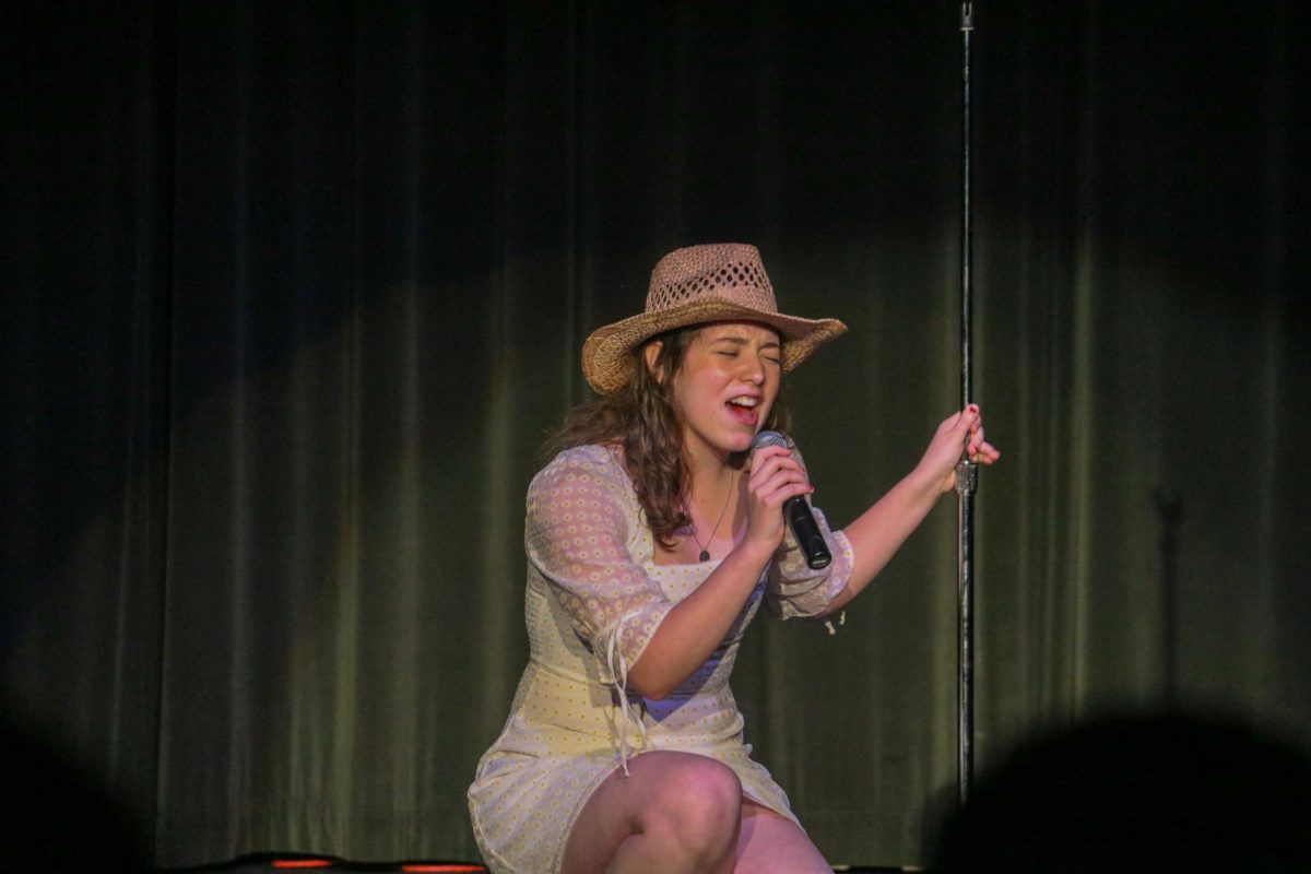 Olivia Prue singing "The Giver" 