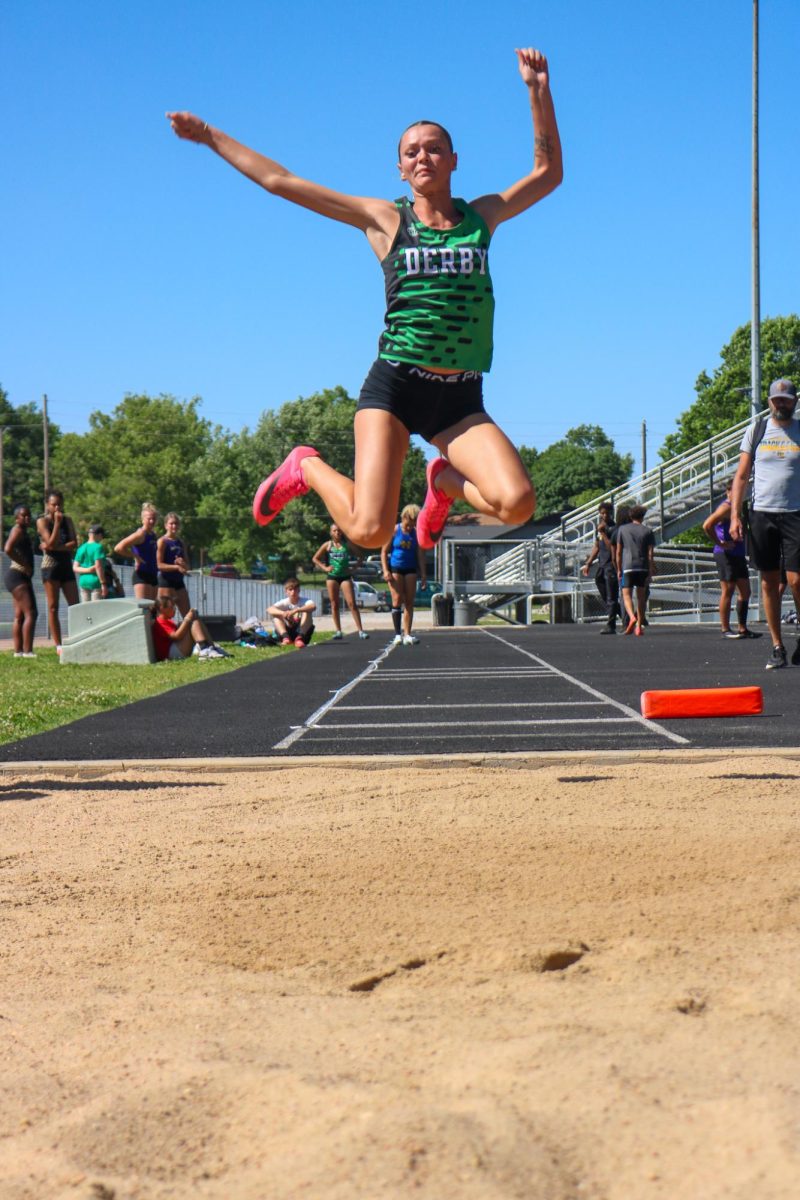 students doing long jump