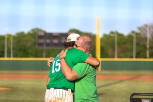 Junior Bryson Maldonado hugging his step dad.