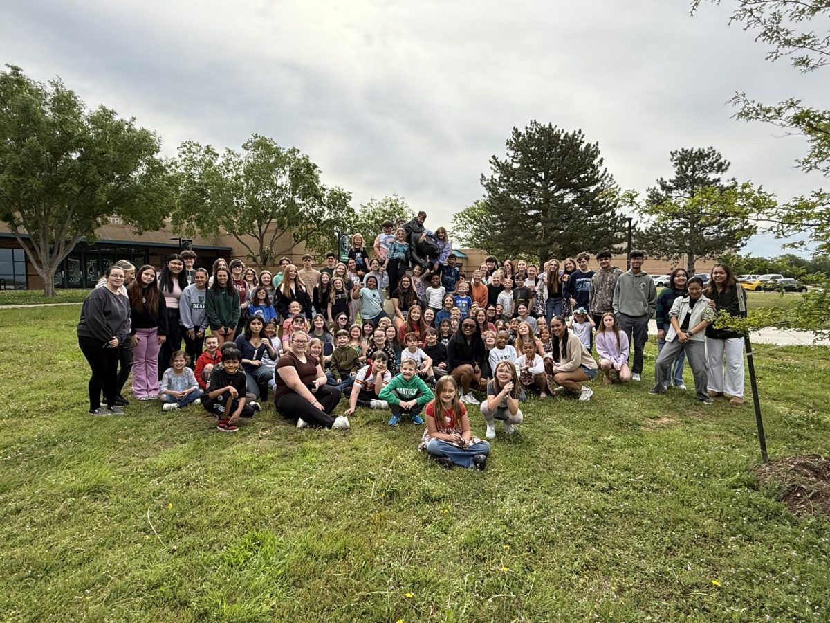 Stuco members and 2nd grade Buddies posing for picture at DHS panther.