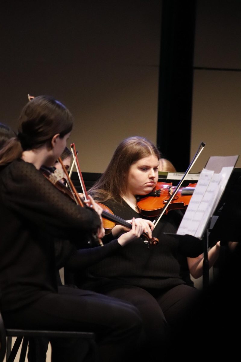 Student playing violin