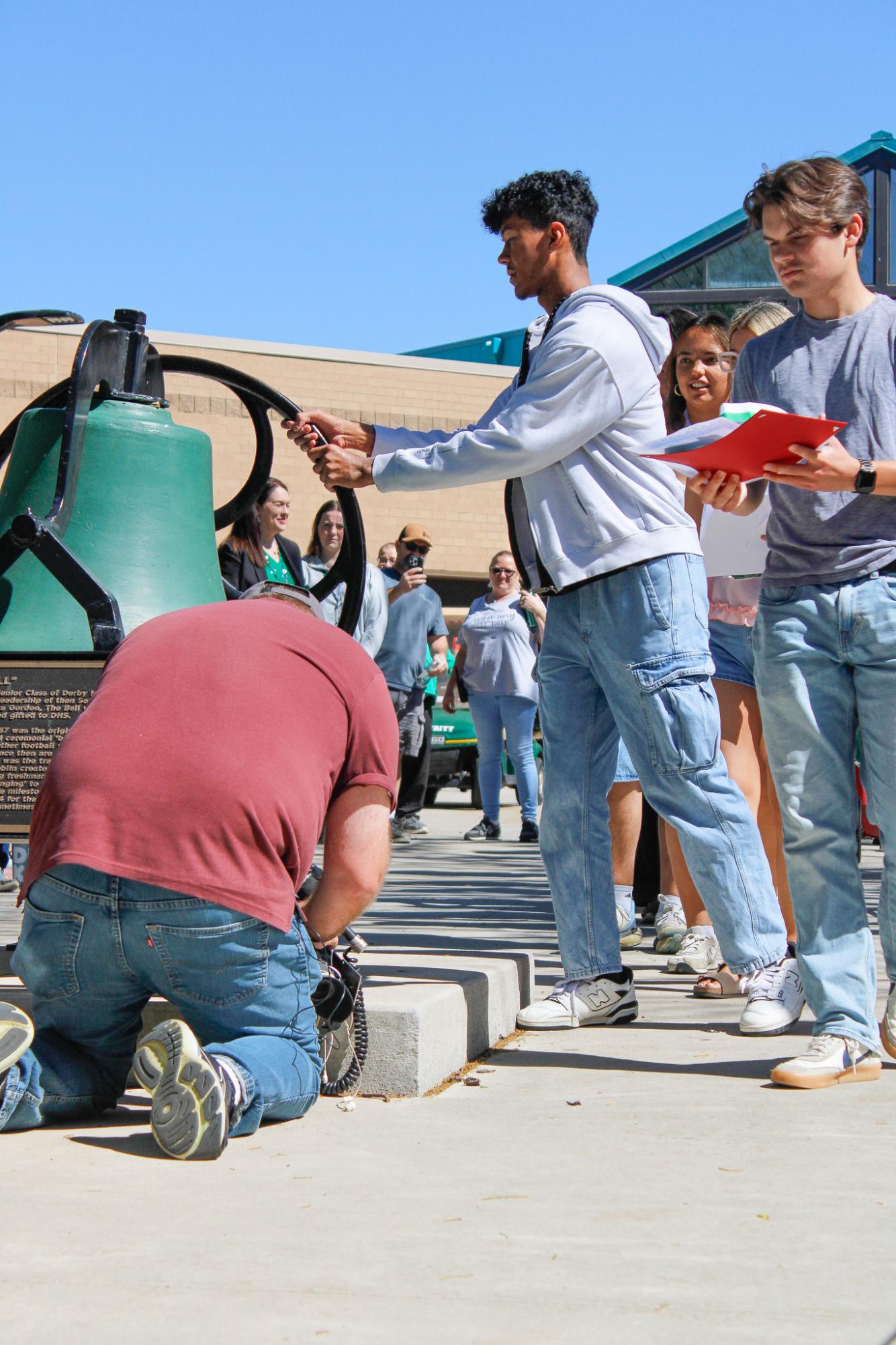 2025 Bell Ringing (Photos by Bree Stuhlsatz