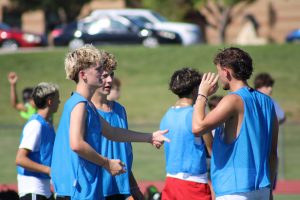 Boys varsity soccer practices after school at the football field.
