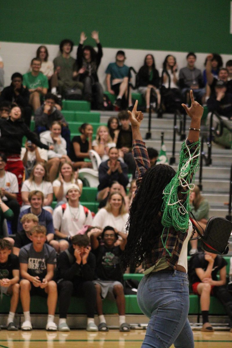 Student celebrates winning Rock, Paper, Scissors