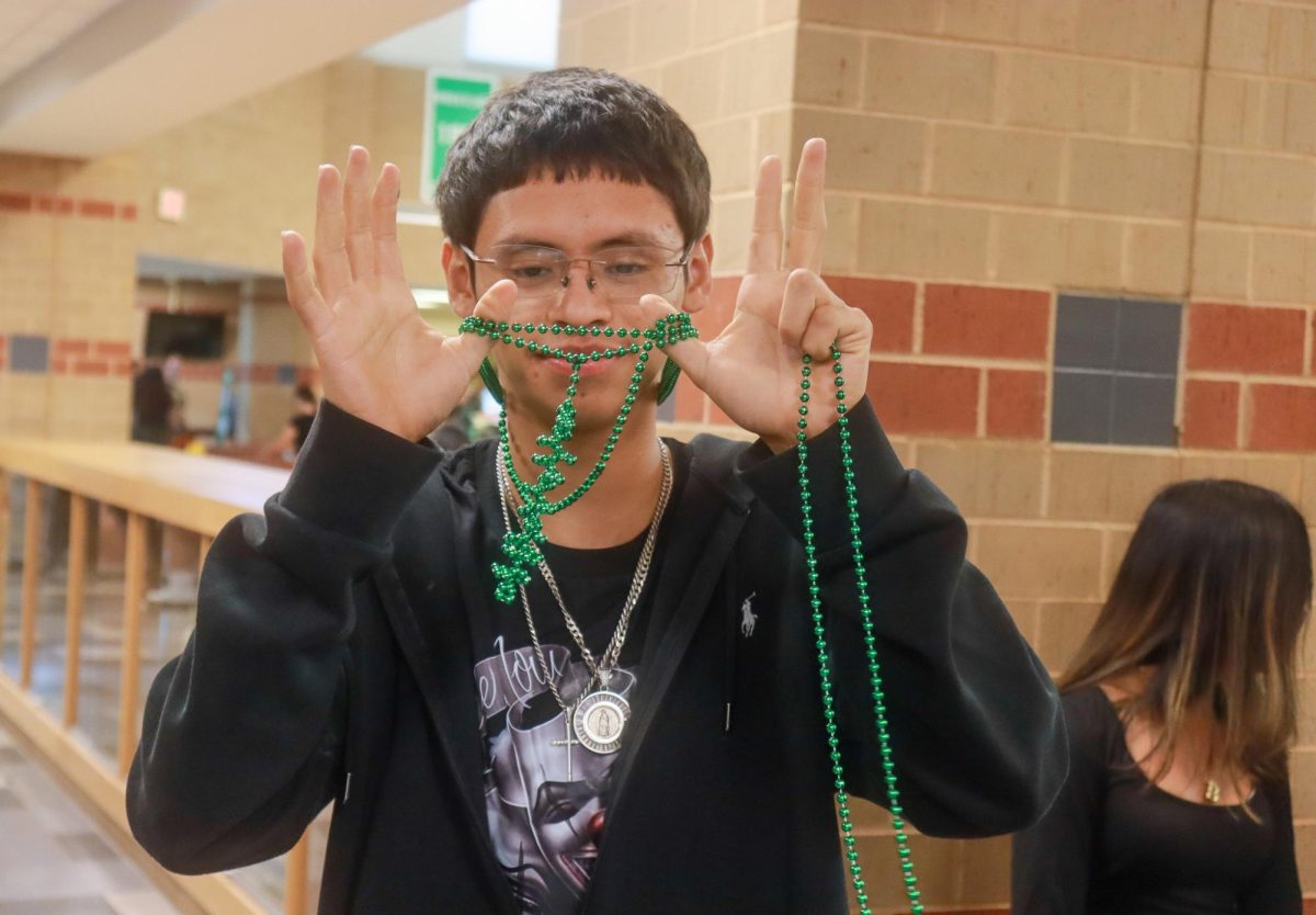A Panther shows off his necklaces, which he had spun into a creative decoration.
