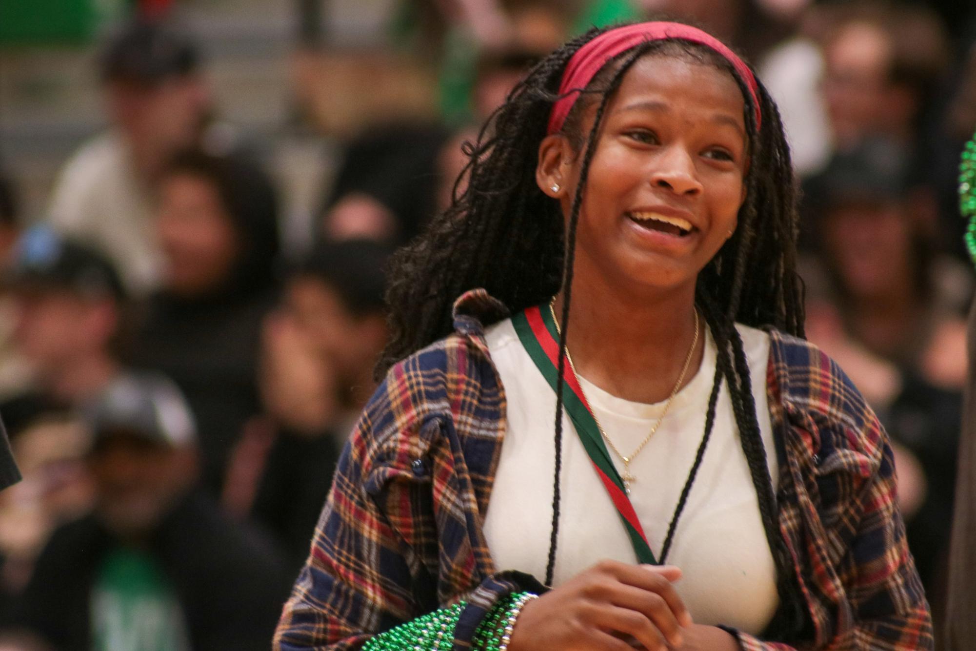 Junior smiles cheerfully after making it to the final round of rock paper scissors.