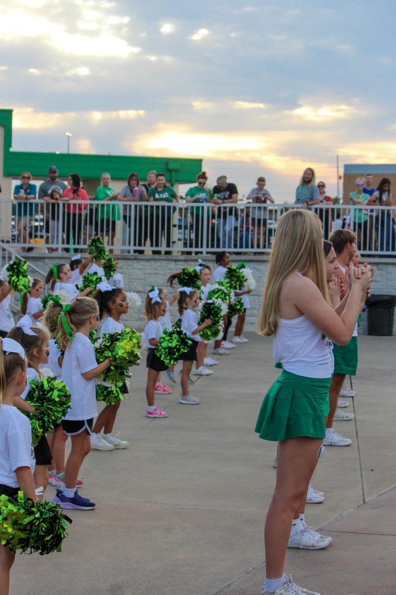 Derby Cheer team hosted their youth cheer team clinic, and performed halftime of a JV game.