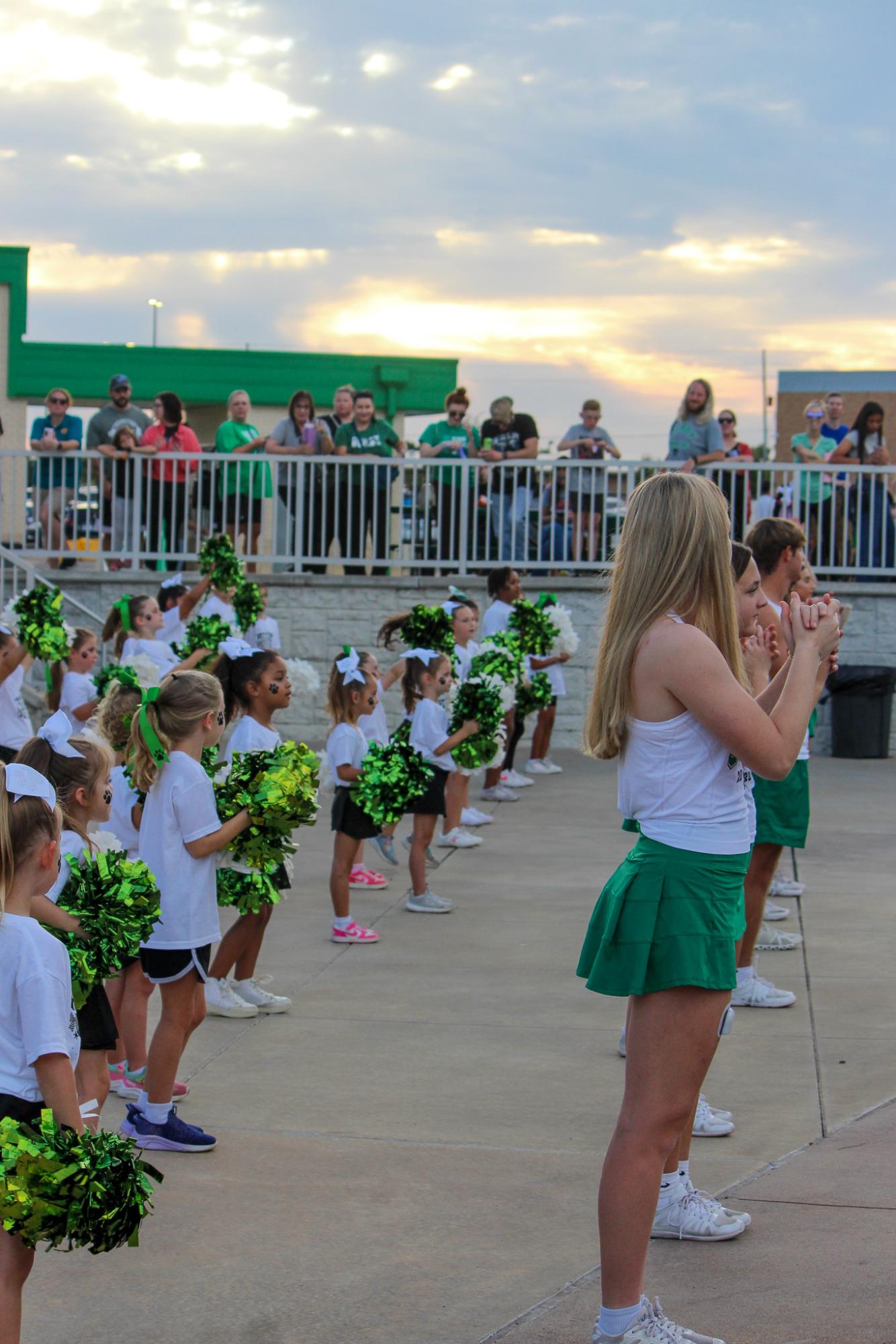Derby Cheer team hosted their youth cheer team clinic, and performed halftime of a JV game.