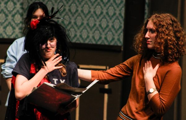 Students perform a scene. 