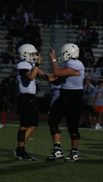 Navigation to Story: Football vs. Campus (photos by Alex Flores)