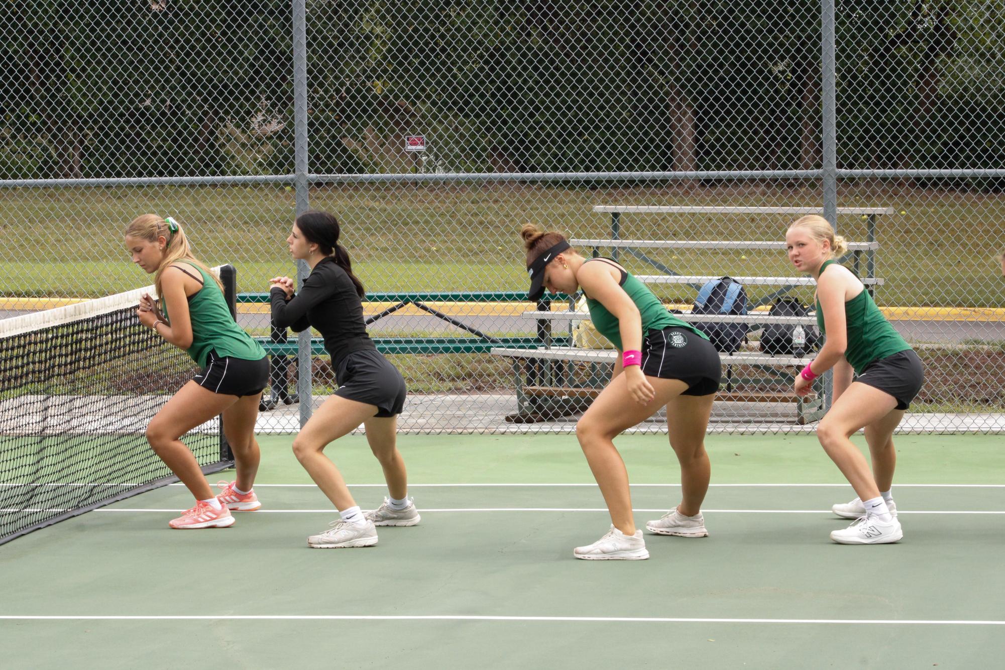 Girls varsity tennis warms up (Photos by Brianna Santillan)