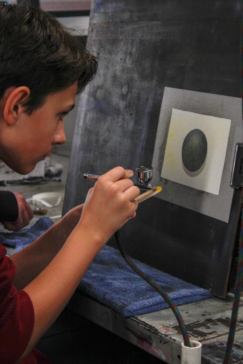A student works on a piece.