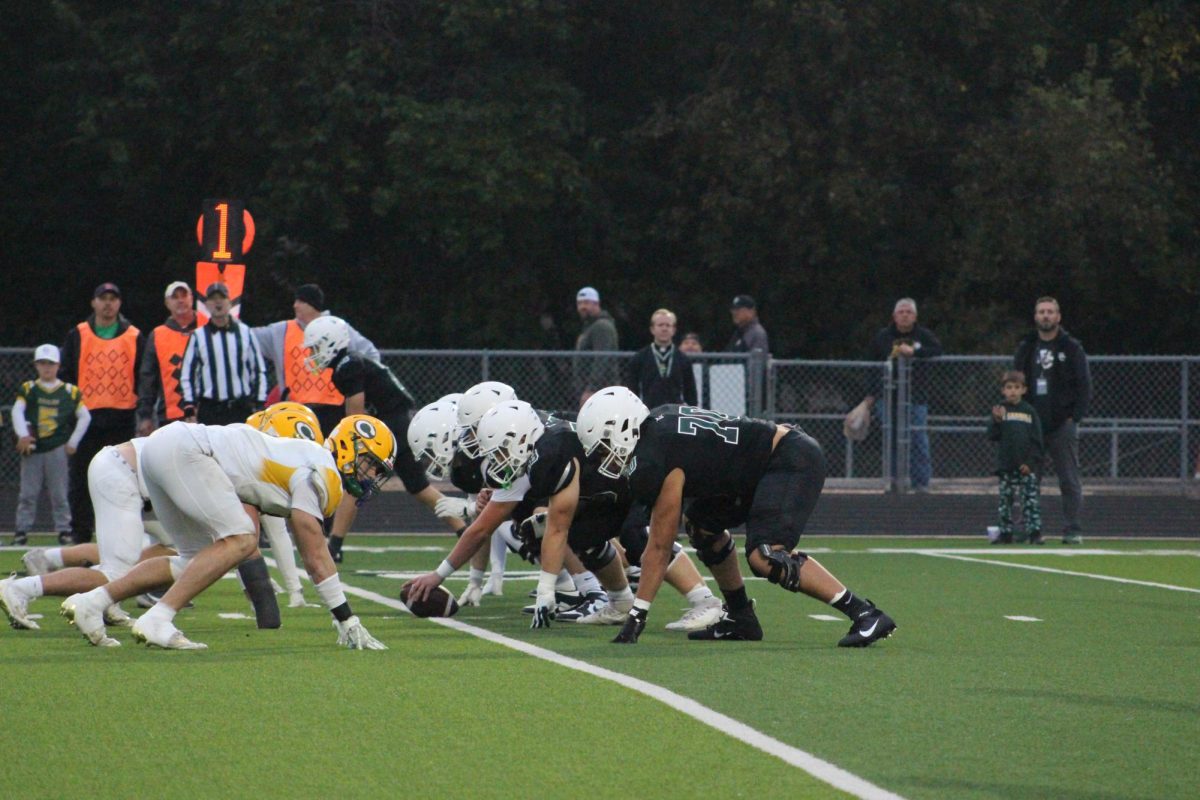 Football players prepare to play