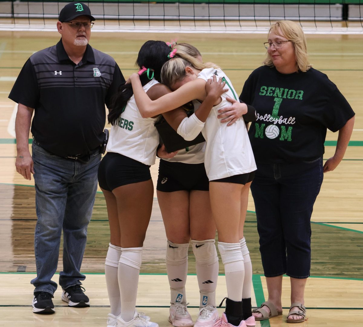 Derby volleyball featured their four seniors in between games. The seniors featured are Lilian Like, Ella Ediger, Mckinley Sinclair and foreign exchange student Marta Bettoni.