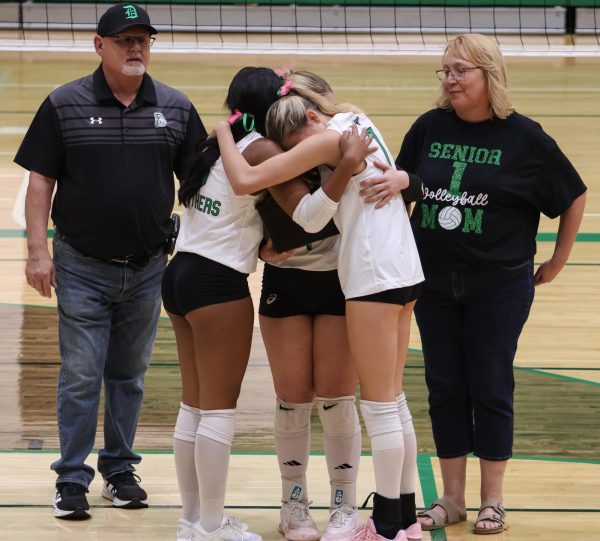 Derby volleyball featured their four seniors in between games. The seniors featured are Lilian Like, Ella Ediger, Mckinley Sinclair and foreign exchange student Marta Bettoni.