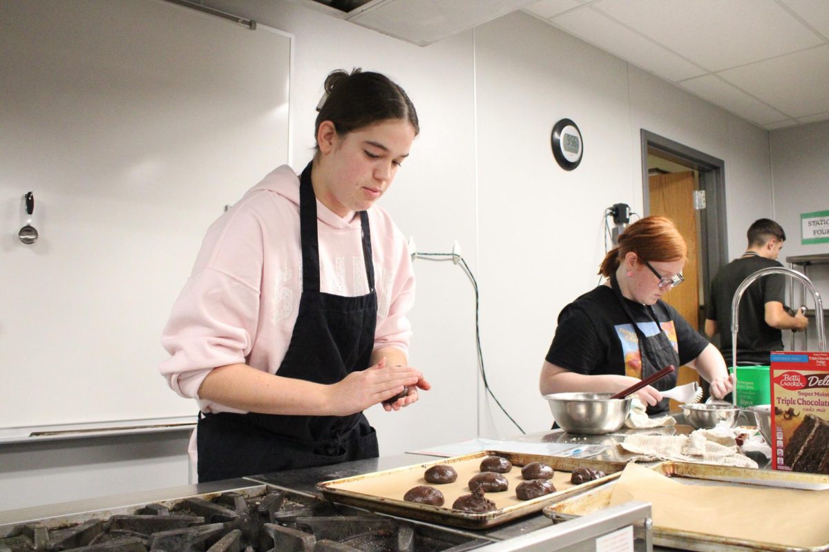 Mrs. Dill's culinary classes made lemon, chocolate, and strawberry cookies to hand out at the first football game; Military Appreciation Night.