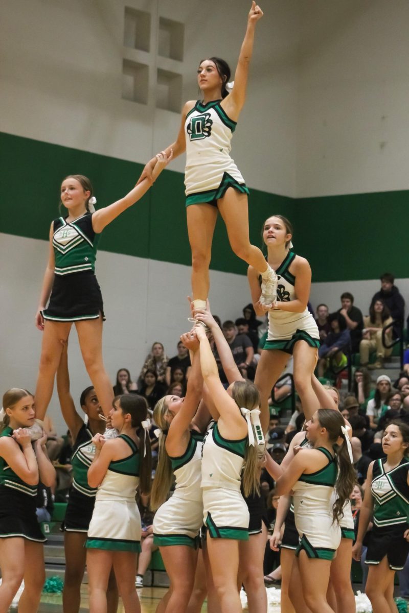 Cheerleaders preforming for the pep assembly.