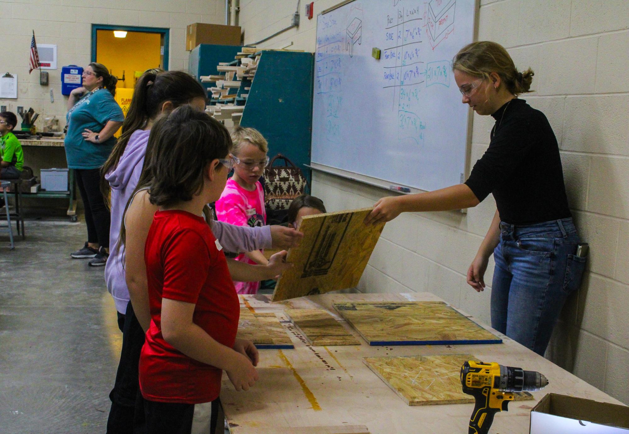 3rd grade students building Bat Houses (Photos By Ava Phouangmala)