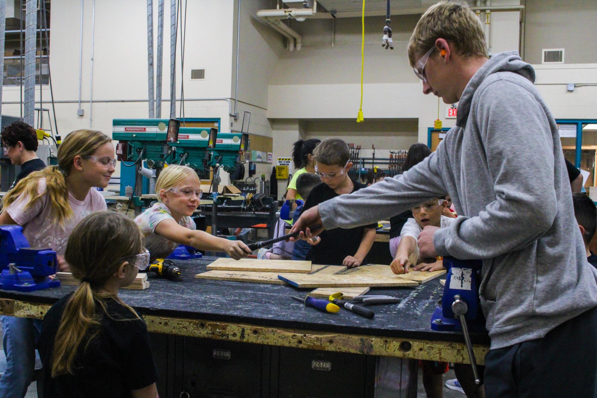 3rd grade students building Bat Houses (Photos By Ava Phouangmala)