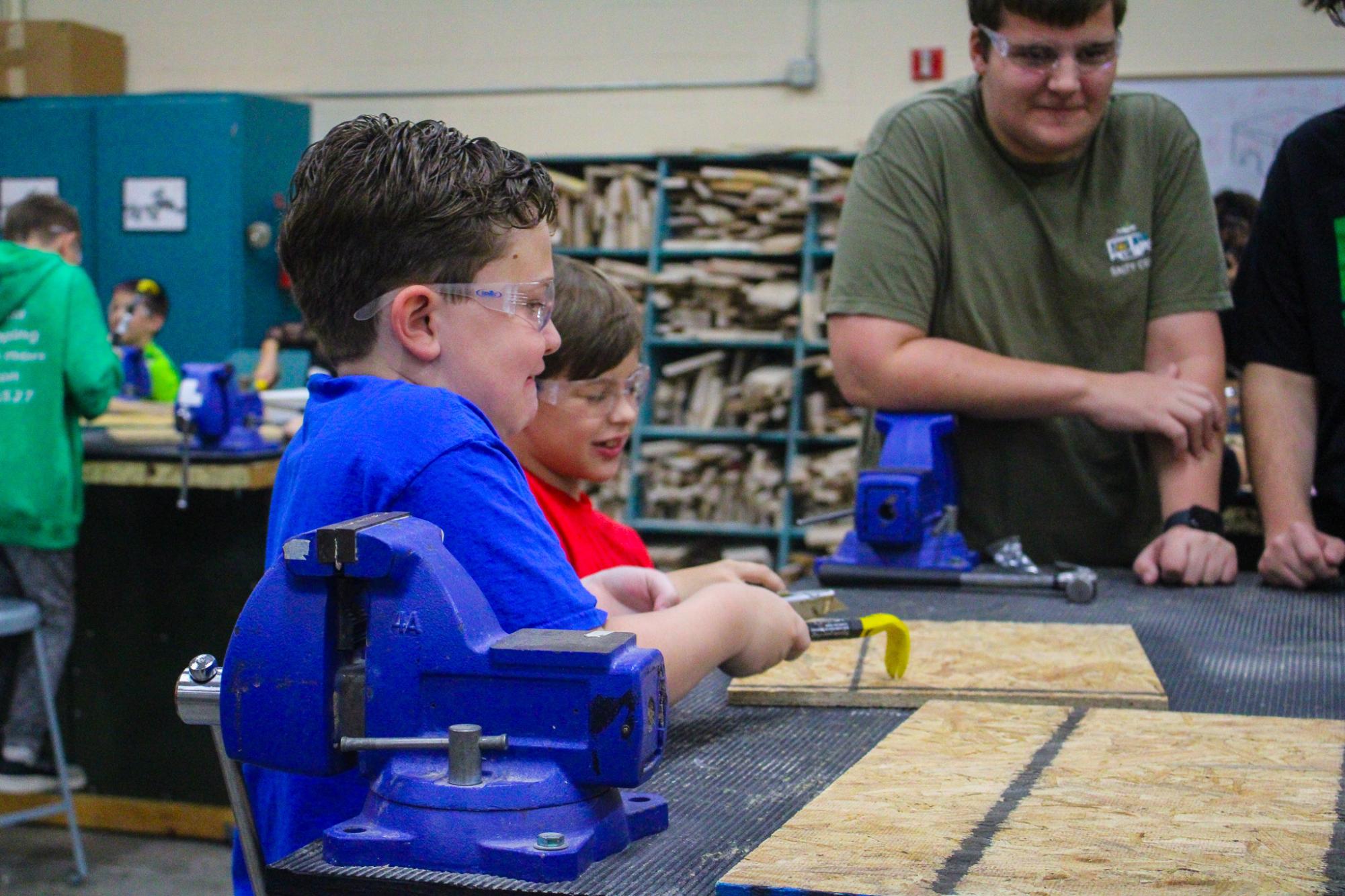 3rd grade students building Bat Houses (Photos By Ava Phouangmala)