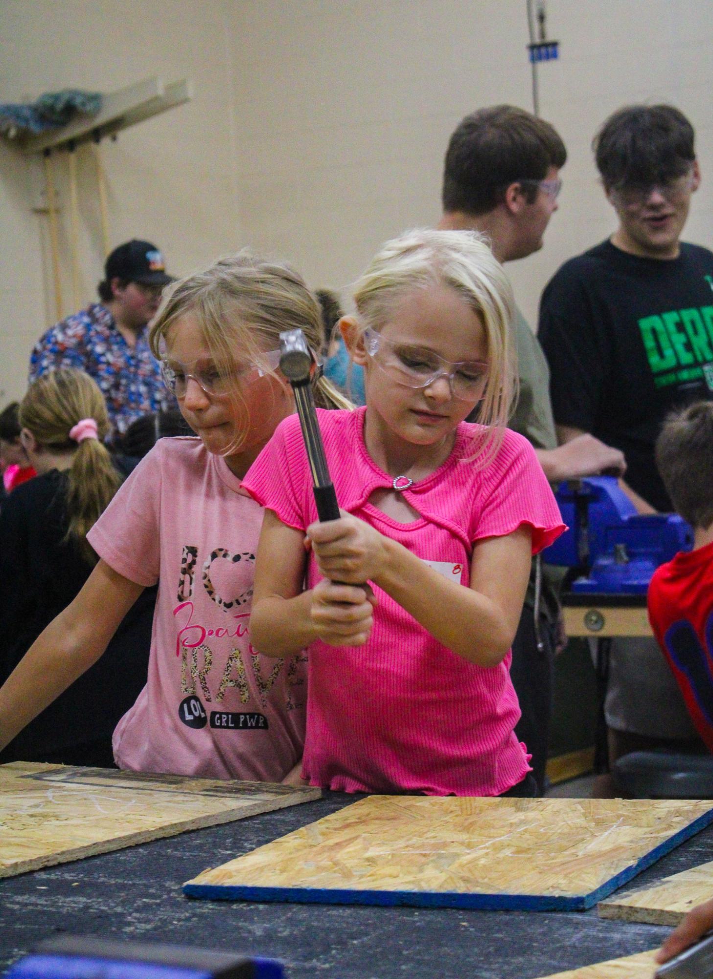 3rd grade students building Bat Houses (Photos By Ava Phouangmala)